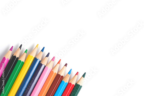 Set of colored pencils on white background.
