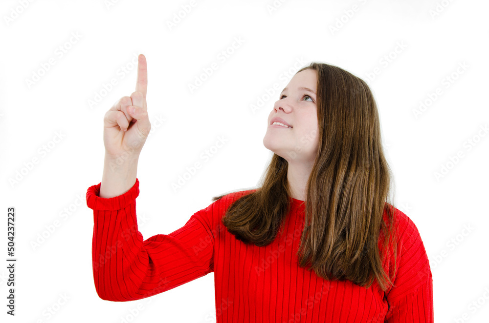 Close up portrait of beautiful girl pointing with finger. Portrait of pretty teenage girl pointing up. Isolated on white background. Studio shot Close up portrait of beautiful girl pointing with finger. Portrait of pretty teenage girl pointing up. Isolated on white background. Studio shot