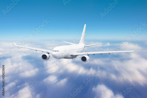 Aircraft flies motion effect high in the sky over the clouds  traveling in the celestial expanse.