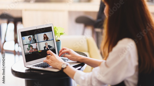 Back view of Screen video conference facetime meeting monitor of multiethnic business people having VDO conference live streaming.Group of diverse people smart working from home