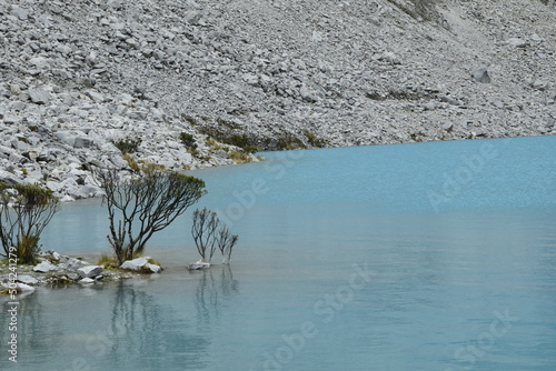 Lake Laguna 69 and Chakraraju mountain are situated in the Huascaran National Park in the Andes of Peru photo