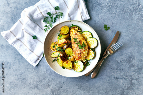 Sesame Chicken Breast with Baked Potatoes and Zucchini