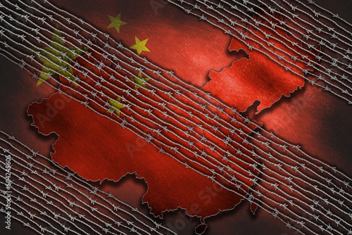 Barbed wire on the border of China on the Chinese flag on a retro background