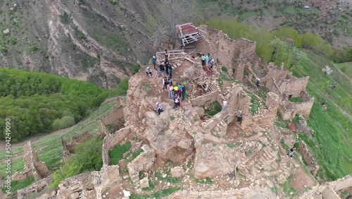 panoramic view of the Caucasus mountains gorges ancient fortresses and curved mountain roads on a spring day