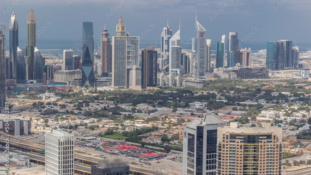 Fototapeta premium Rows of skyscrapers in financial district of Dubai aerial timelapse.