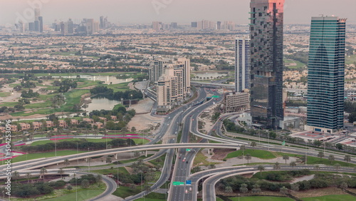 Huge highway crossroad junction between JLT district and Dubai Marina intersected by Sheikh Zayed Road aerial timelapse.