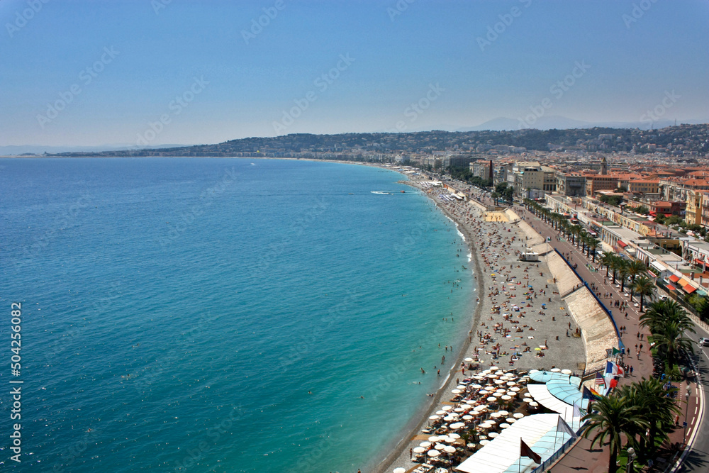 Panorama photo of the Promenade de Anglais taken in Nice, France on a sunny summer day. Image was taken on the way to Colline du Château (Castle Hill).