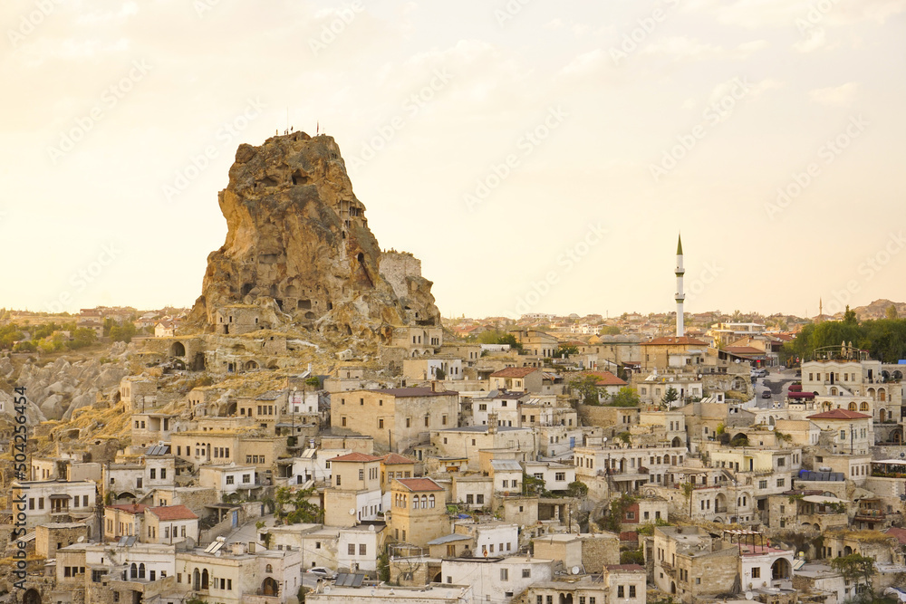 View of Ortahisar town old houses in rock formations from Ortahisar Castle. Cappadocia. Nevsehir Province. Turkey