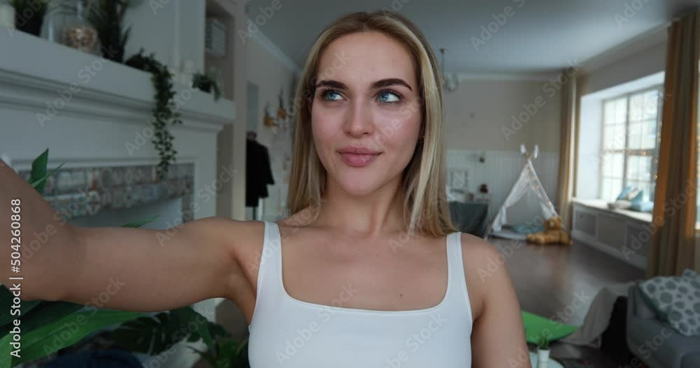 Beautiful blonde woman taking selfie on smartphone. Beautiful blonde woman taking selfie on smartphone.