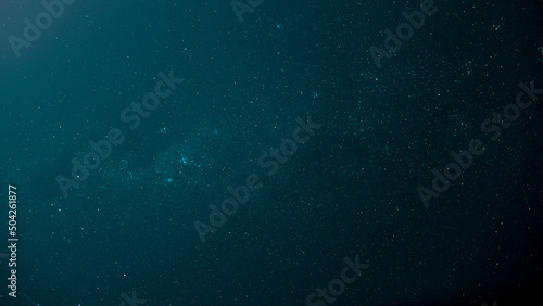 Low-angle shot of a starry night blue sky