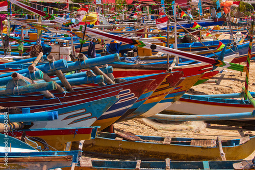Fishing boats, lined up on the Jimbaran beach, Bali, Indonesia