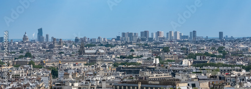 Paris, aerial view of beautiful monuments, the new courthouse, the Pantheon dome, Notre-Dame church, typical roofs 
