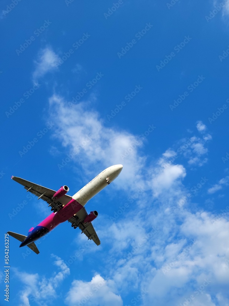 Obraz premium Big airplane in the clouds