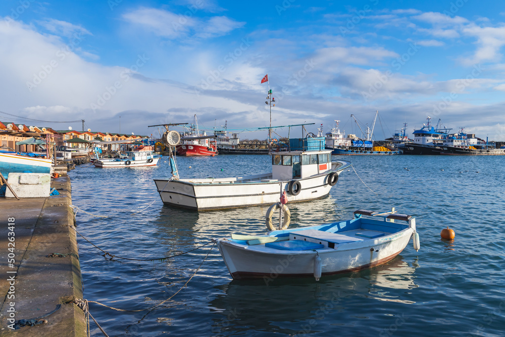 Small fishing boats moored in harbor of Arakli, Trabzon, Turkey