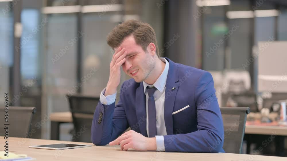 Sleepy Businessmanhaving Headache While Sitting in Office Sleepy Businessmanhaving Headache While Sitting in Office