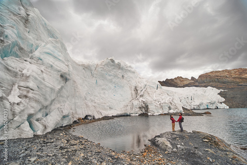 Tourist couple enjoying the Pastoruri glacier
