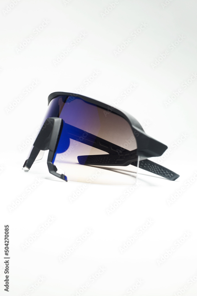 Sports sunglasses from the side on white background Sports sunglasses from the side on white background
