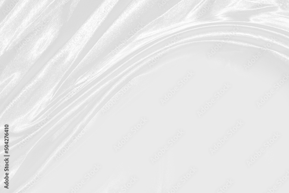 Fototapeta premium Smooth elegant white silk or satin luxury cloth texture can use as wedding background. Luxurious background design