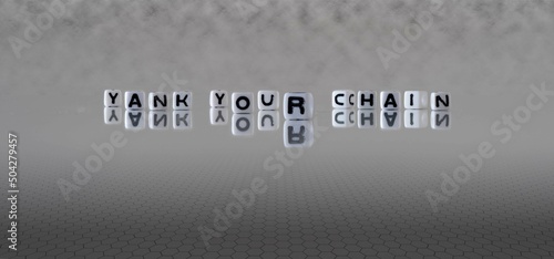 Εκτύπωση καμβά yank your chain word or concept represented by black and white letter cubes on a