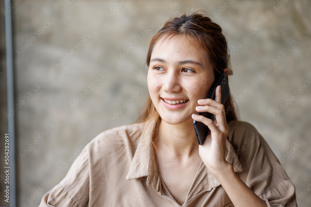 Asian businesswoman or accountant working on calculator to calculate business data, accounting document, and laptop computer at home office, business concept Asian businesswoman or accountant working on calculator to calculate business data, accounting document, and laptop computer at home office, business concept