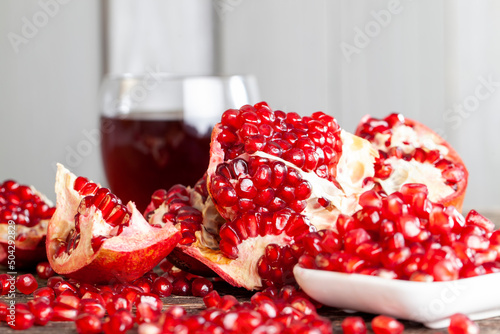 Vászonkép ripe red pomegranate whose grains are used for nutrition