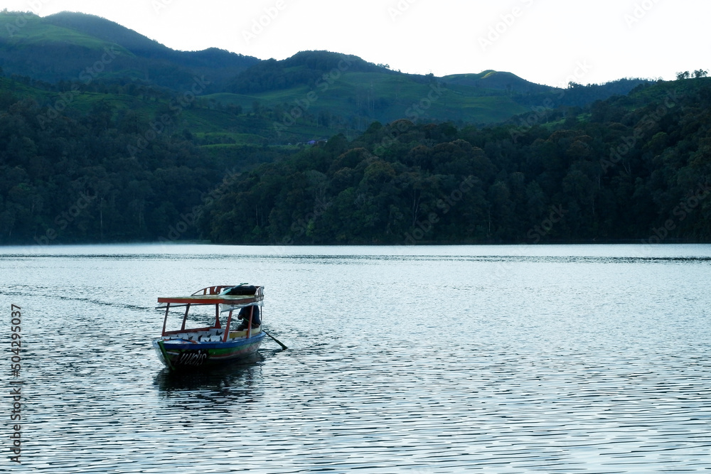 Wooden Boat On The Mountain Lake 