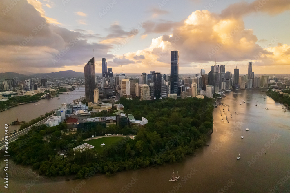 Aerial Brisbane City, Queensland Australia Downtown Region Aerial Night Highway cars streak Sunset Dusk Evening River All Logos Blurred