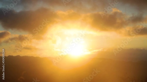 Time-lapse photography of cloud sunrise in alpine field
