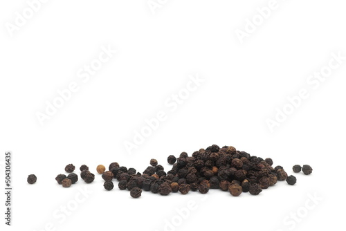 Whole black pepper spice or Piper nigrum dried berries isolated on white background.