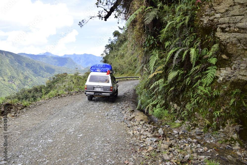 The car on the Death road, Yungas North Road between La Paz and Coroico, Bolivia