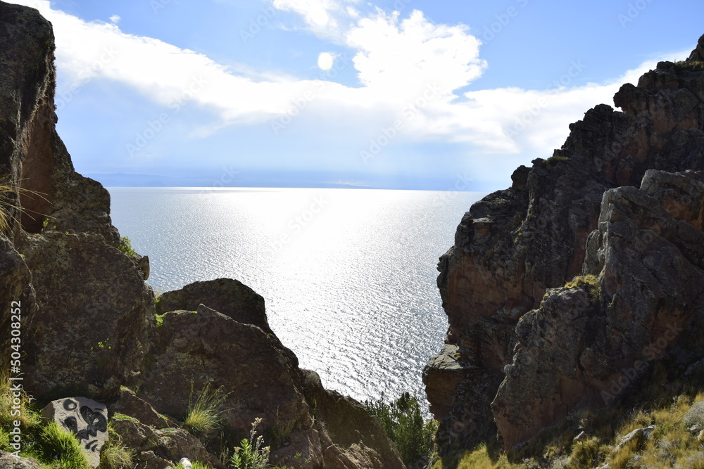View of Lake Titicaca between two rocks. Copacabana, Bolivia View of Lake Titicaca between two rocks. Copacabana, Bolivia