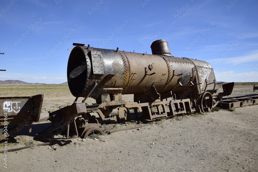 old rusty trains at the antique train cemetery close to the salt flats of Uyuni. Bolivia.