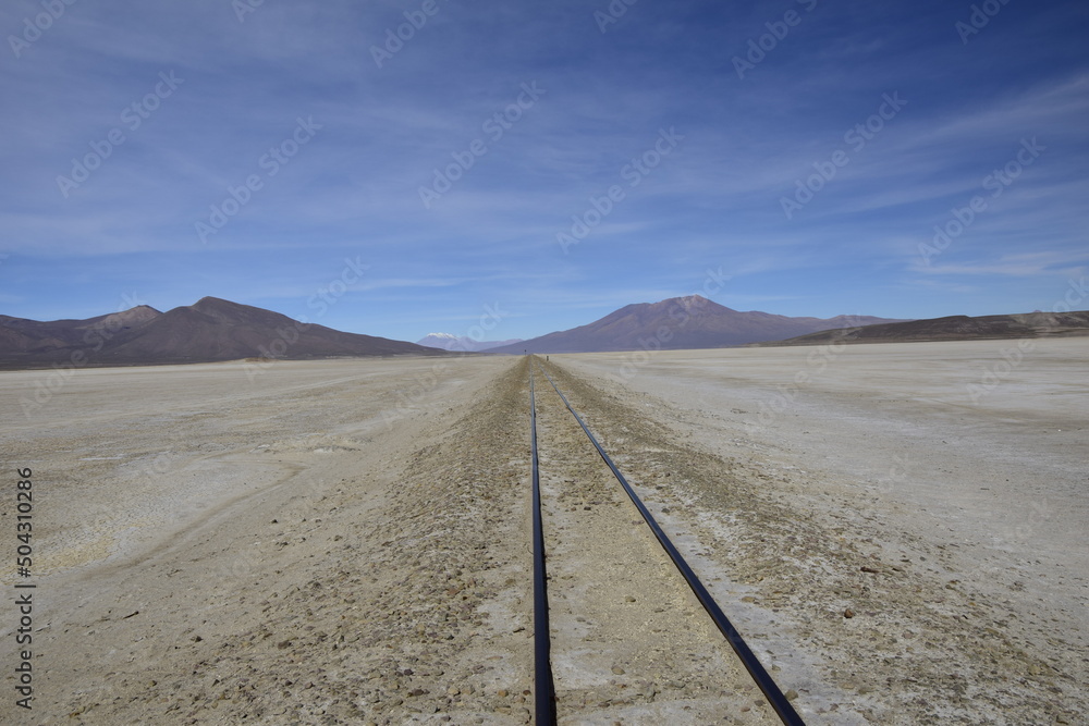 Railway rails on the territory of Salar de Uyuni, Bolivia