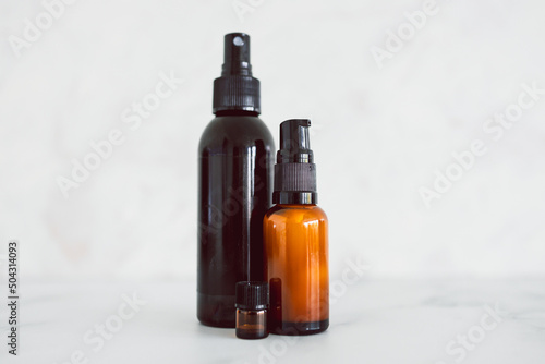 natural beauty and organic ingredients in skincare, apothecary skincare bottles on white marble