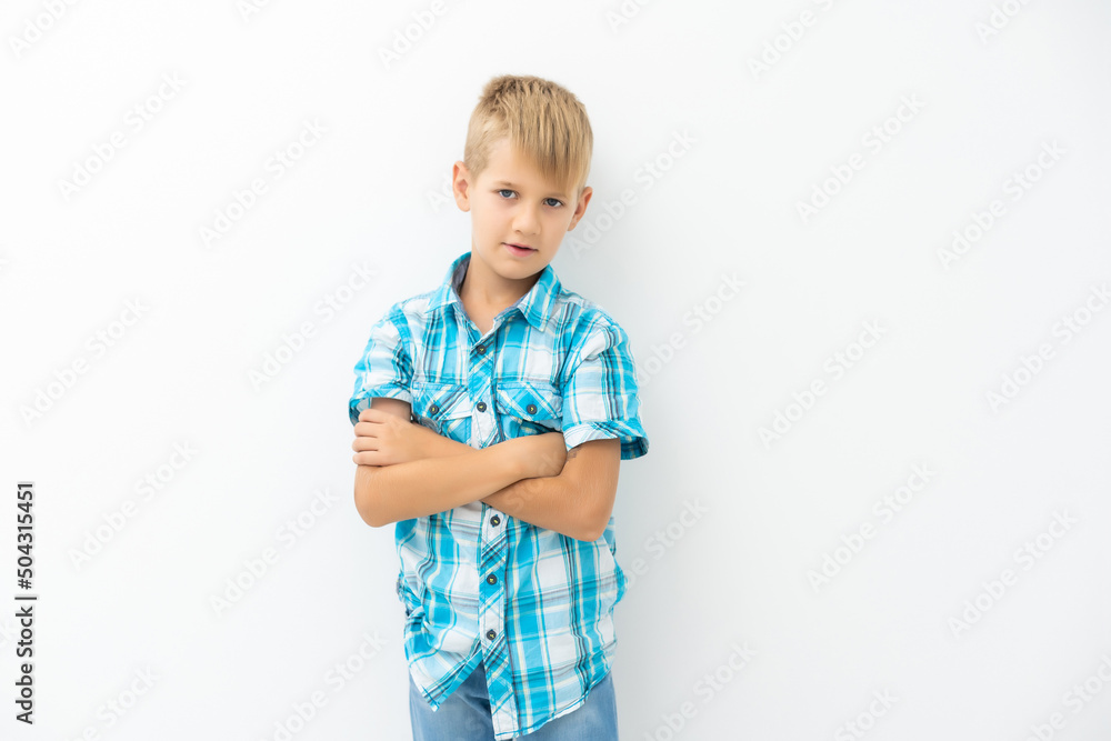 Photo of adorable young happy boy looking at camera. Photo of adorable young happy boy looking at camera.