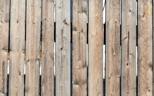 Wooden boards on the fence as an background.