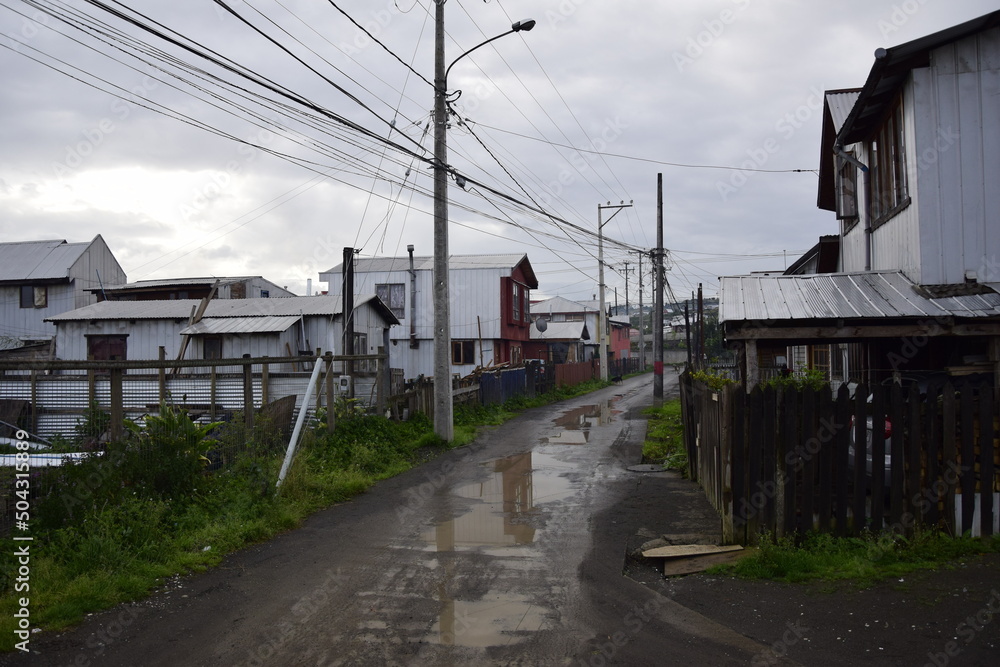 QUELLON, CHILE. Residential area with typical wooden houses QUELLON, CHILE. Residential area with typical wooden houses
