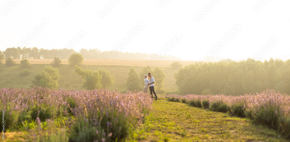 Beautiful couple on the lavender field Beautiful couple on the lavender field