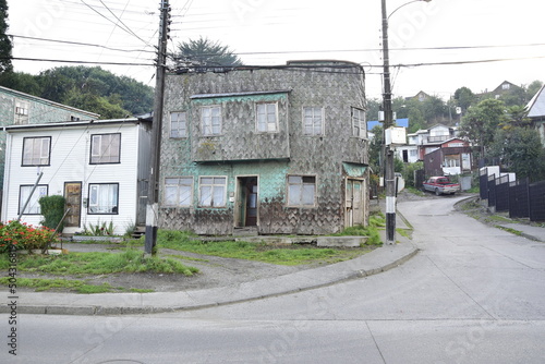 QUELLON, CHILE. Residential area with typical wooden houses photo