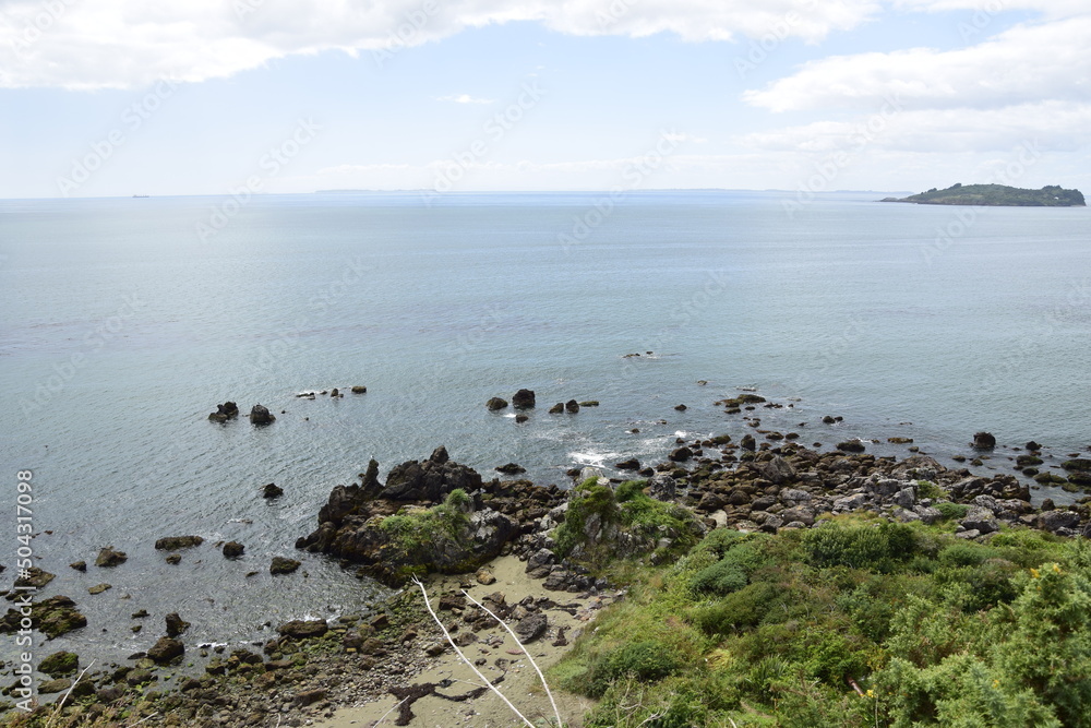 QUELLON CHILE. View of the rocky ocean coast QUELLON CHILE. View of the rocky ocean coast