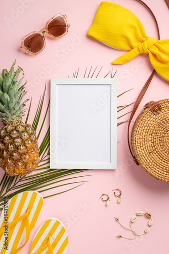 Fotografie, Tablou Top view vertical photo of white frame pineapple round rattan bag yellow swimsui