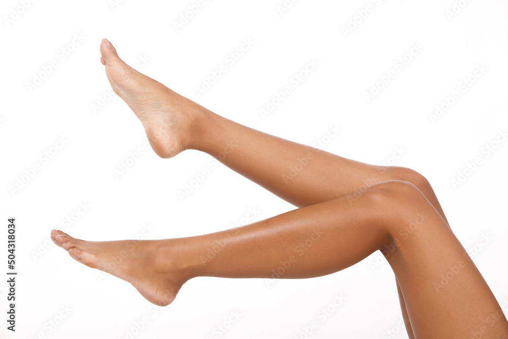 Tanned skin Woman show legs knee foots toe naked as body parts over white background isolated Tanned skin Woman show legs knee foots toe naked as body parts over white background isolated