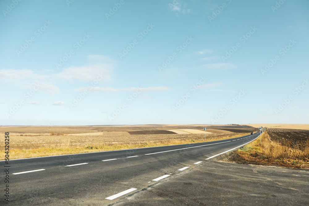 Concept of travel and adventure, asphalt road