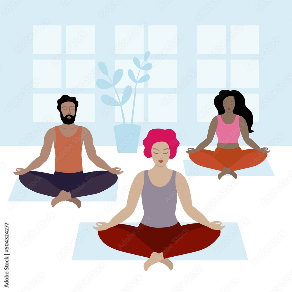 Group of people sitting in lotus position. Yoga class interior.