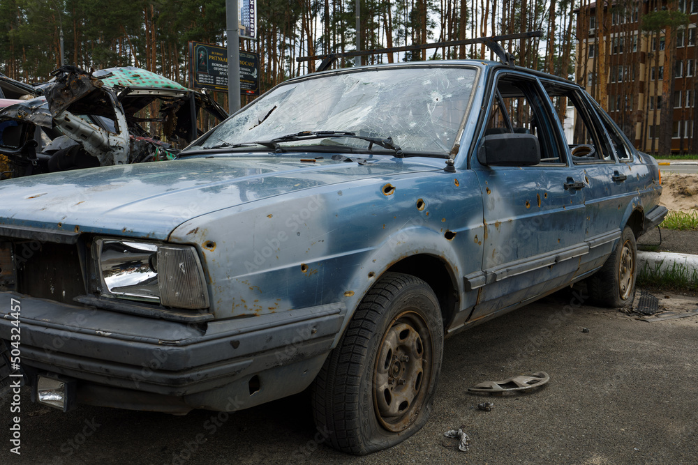 Dump of burnt civilian cars stolen, shoot by the Russian army and destroyed during Russia's war against Ukraine