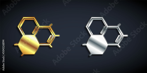 Gold and silver Molecule oil icon isolated on black background. Structure of molecules in chemistry. Long shadow style. Vector