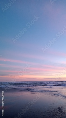 Sea waves water at sunset