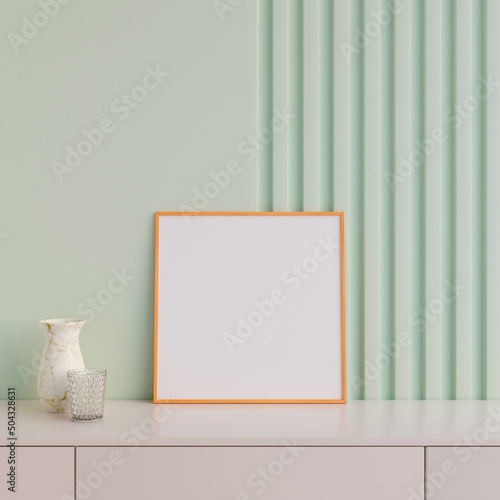 Modern and minimalist square wooden poster or photo frame mockup on the table in the living room. 3d rendering.