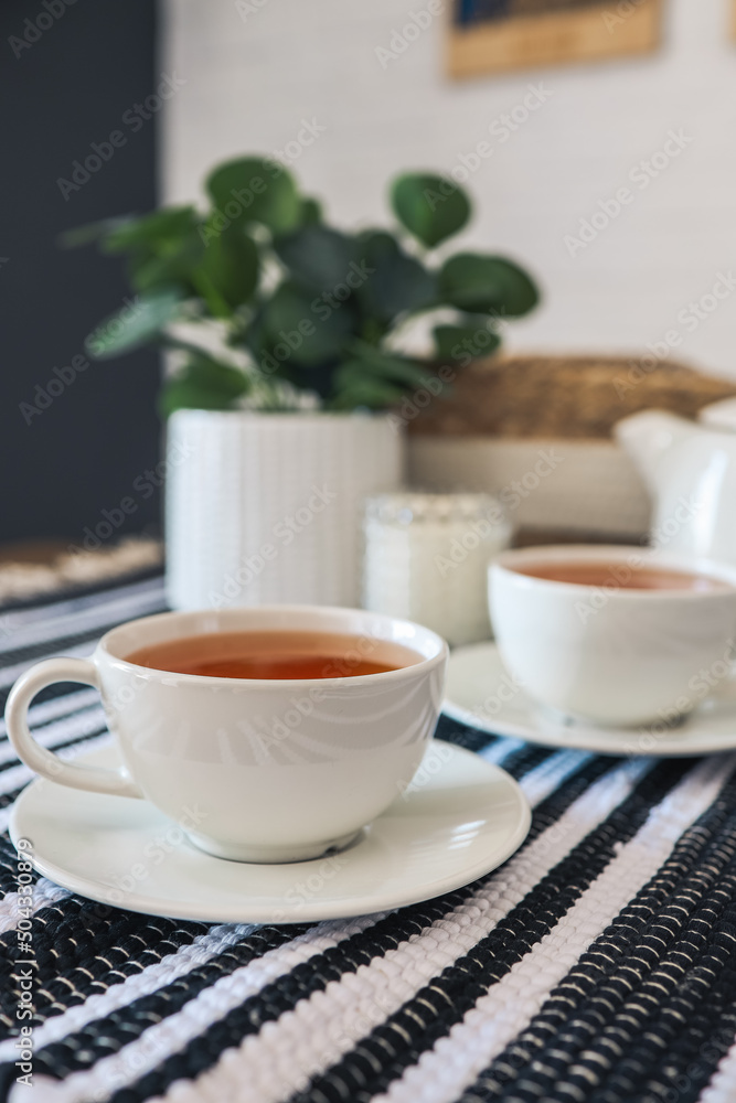 Two cups of tea, tea drinking in Scandinavian cuisine. Beautiful cozy home interior photography Two cups of tea, tea drinking in Scandinavian cuisine. Beautiful cozy home interior photography