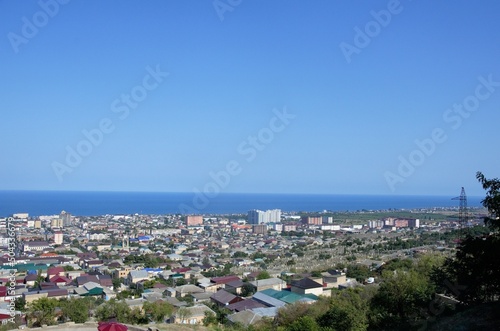 Fototapeta Naklejka Na Ścianę i Meble -  28.08.2021 Russia, Derbent, a trip to Dagestan, in the foreground the city further blue sea Caspian